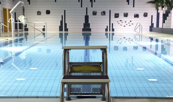 Bild: Der Sprungsockel im Hallenbad Mitterteich. Im Hintergrund sieht man das Schwimmbecken.